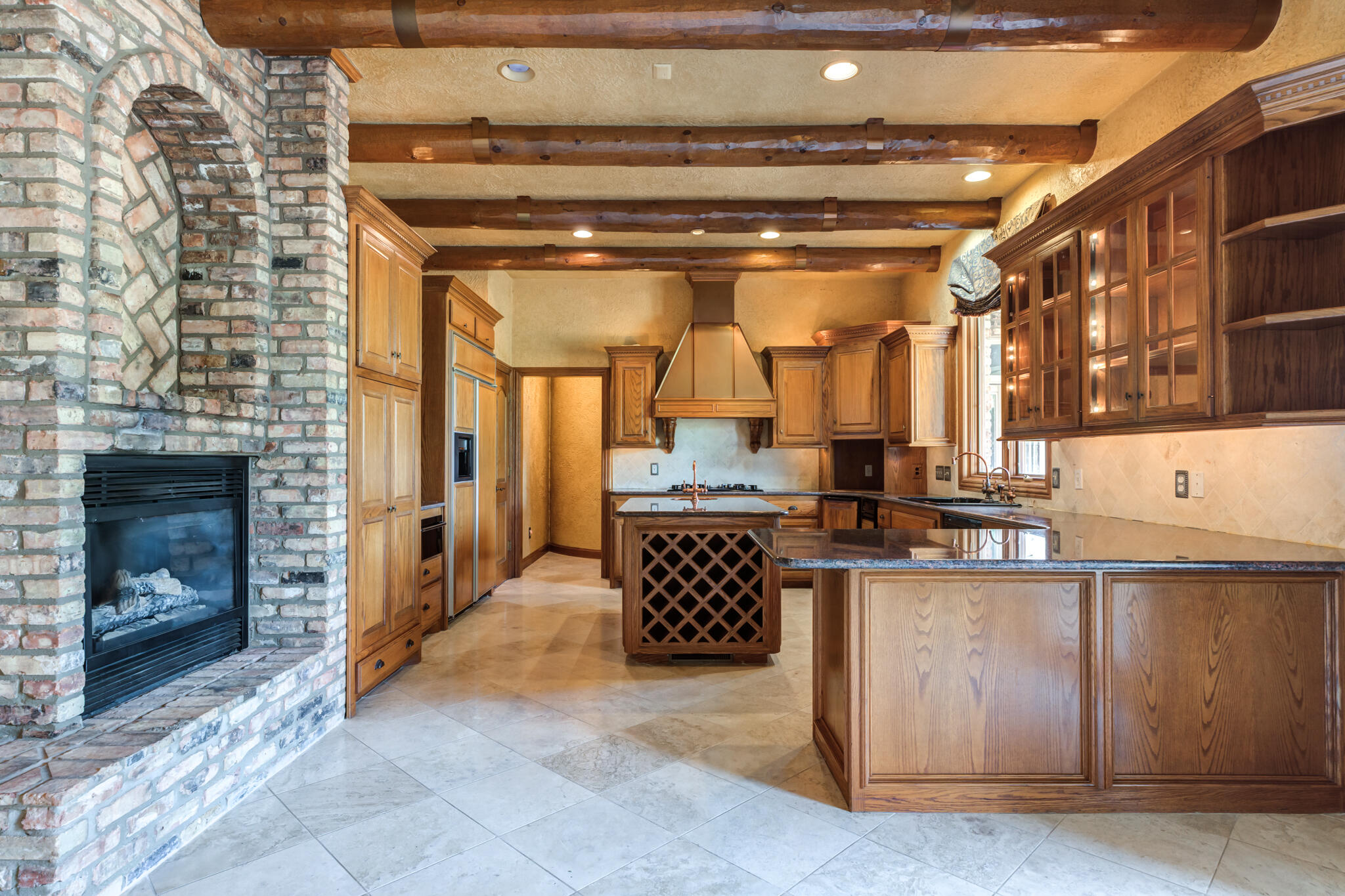 8901 York Place Lubbock, TX 79424 - Photo 11 of 45 a kitchen with a stove and a refrigerator