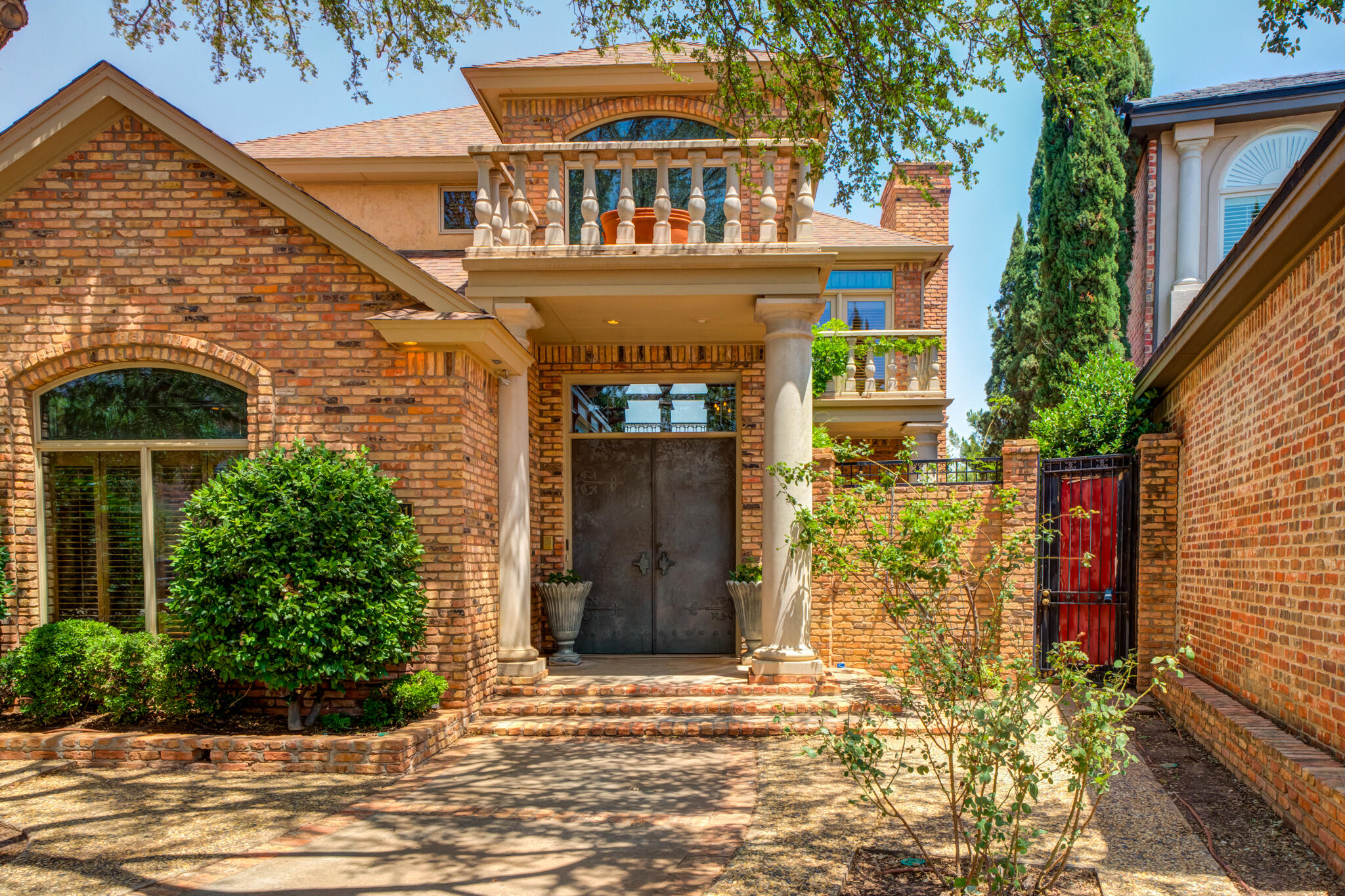 8901 York Place Lubbock, TX 79424 - Photo 2 of 45 a front view of a house with a yard