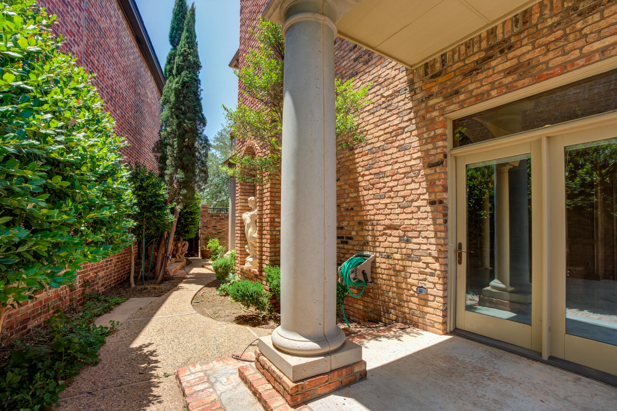 8901 York Place Lubbock, TX 79424 - Photo 42 of 45 a front view of a house with a garden