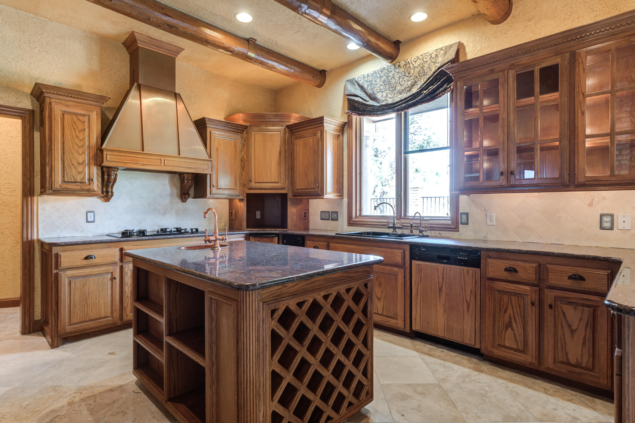8901 York Place Lubbock, TX 79424 - Photo 10 of 45 a kitchen that has a sink and a stove in it