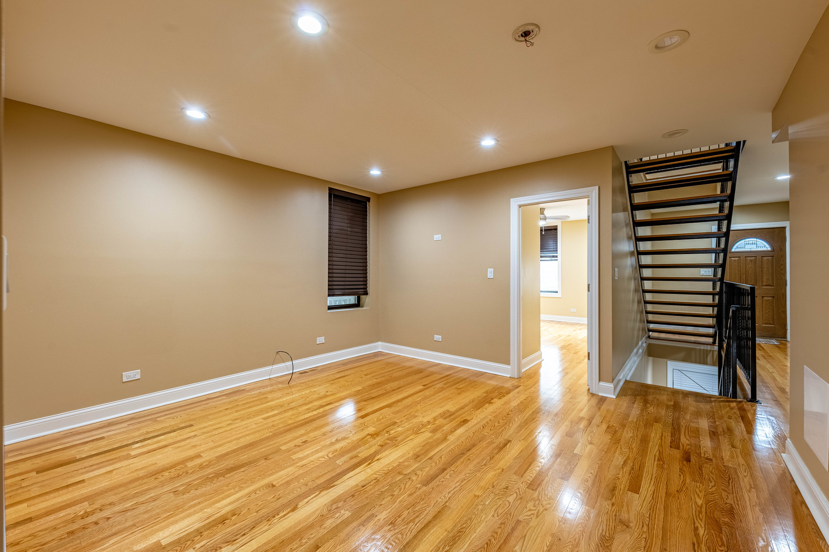 2012 West Coulter Street Chicago, IL 60608 - Photo 11 of 47 a view of empty room with wooden floor