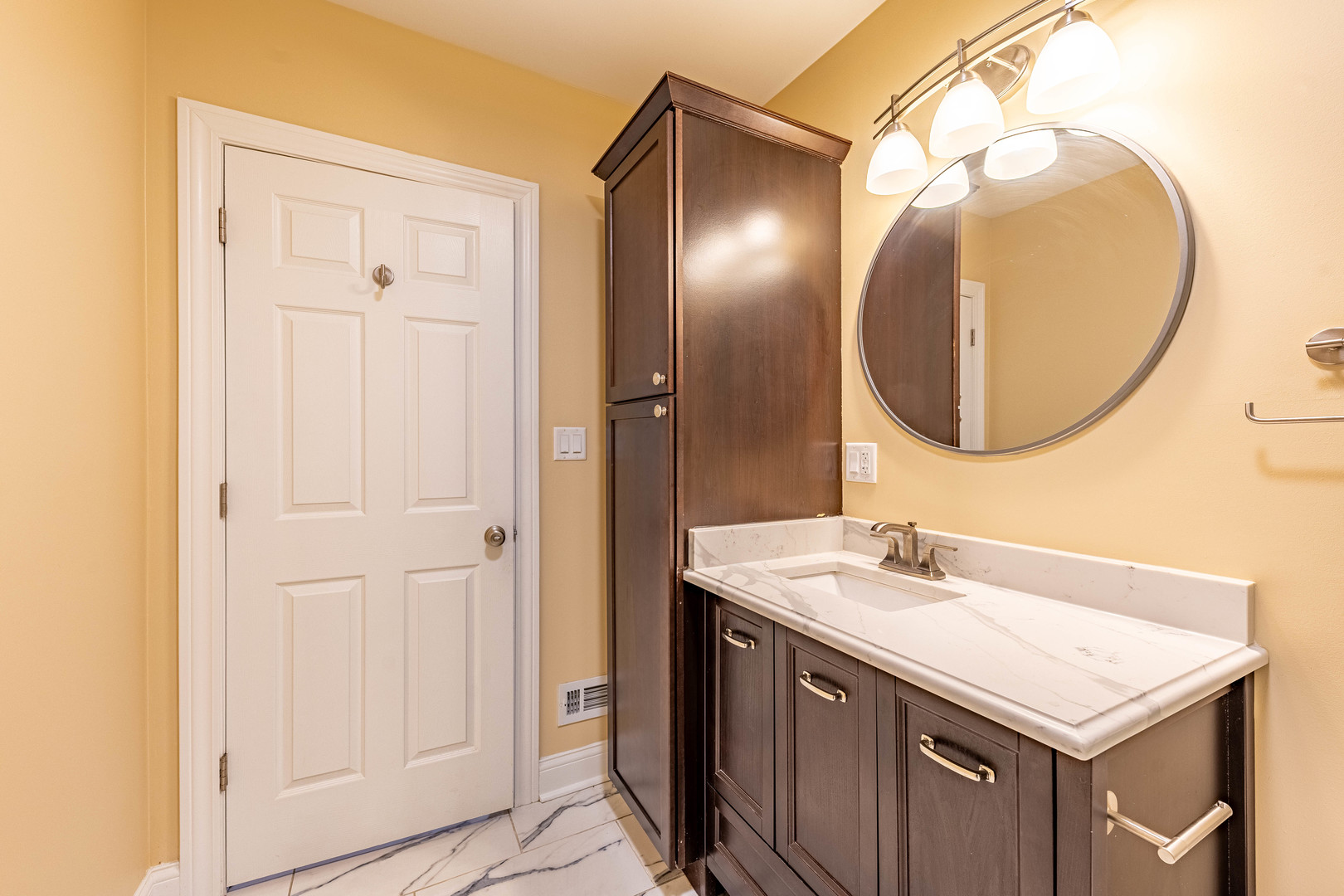 2012 West Coulter Street Chicago, IL 60608 - Photo 17 of 47 a bathroom with a sink and a mirror