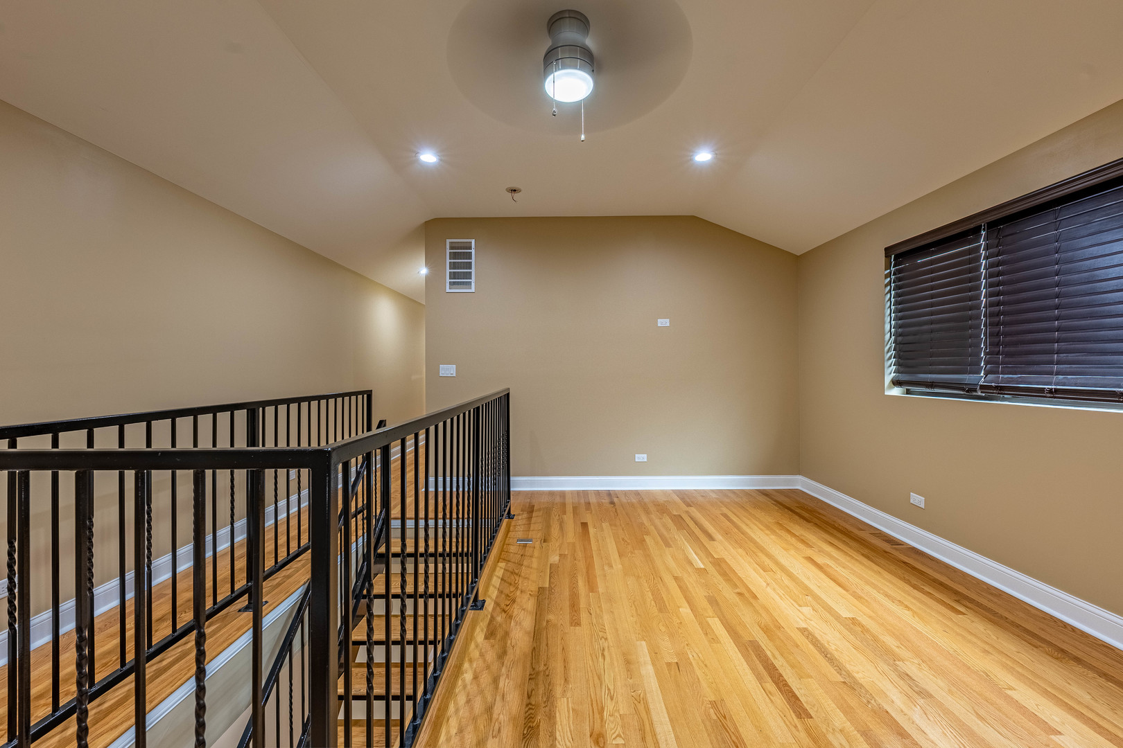 2012 West Coulter Street Chicago, IL 60608 - Photo 18 of 47 a view of hallway with wooden floor