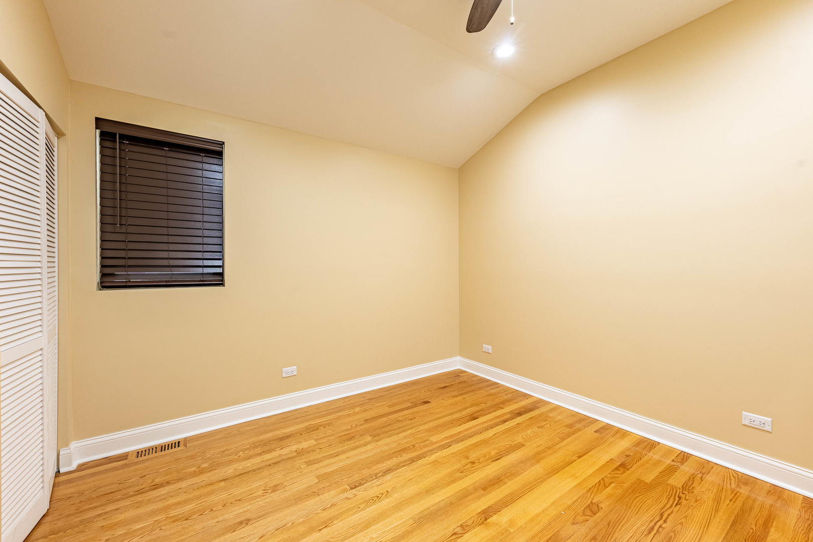 2012 West Coulter Street Chicago, IL 60608 - Photo 20 of 47 a view of empty room with wooden floor and fan