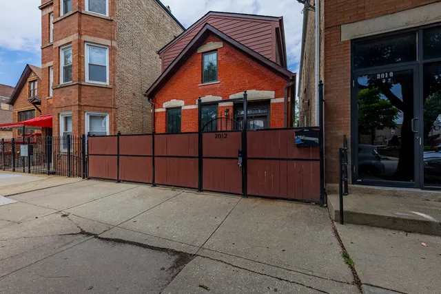 front view of a house with a street