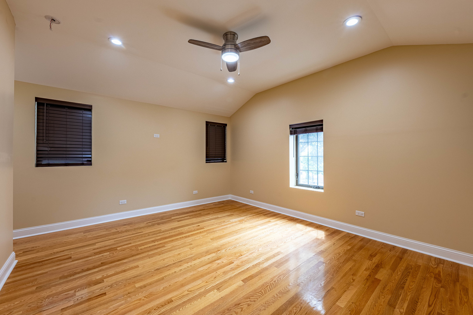 2012 West Coulter Street Chicago, IL 60608 - Photo 28 of 47 a view of an empty room with wooden floor and a window