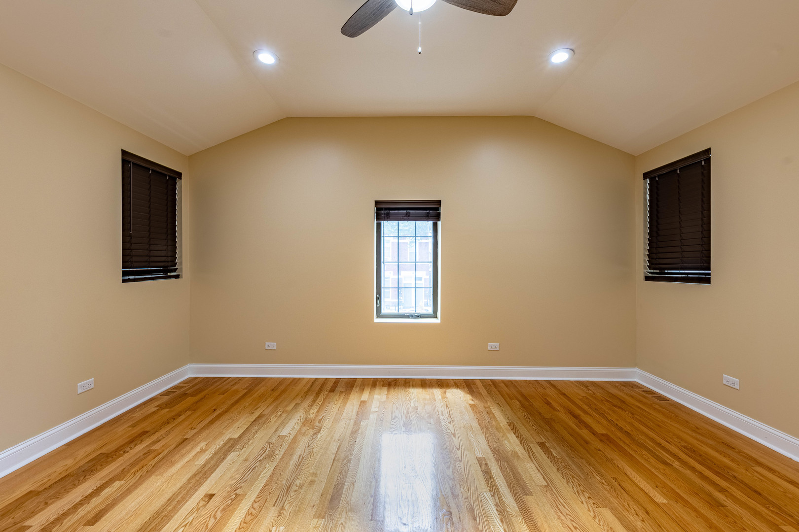 2012 West Coulter Street Chicago, IL 60608 - Photo 29 of 47 a view of an empty room with wooden floor and a window