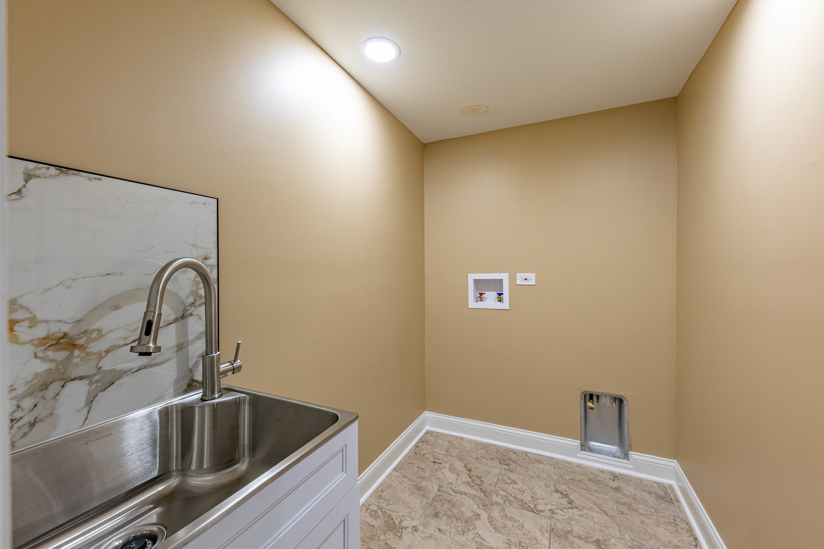 2012 West Coulter Street Chicago, IL 60608 - Photo 37 of 47 a bathroom with a sink and dryer
