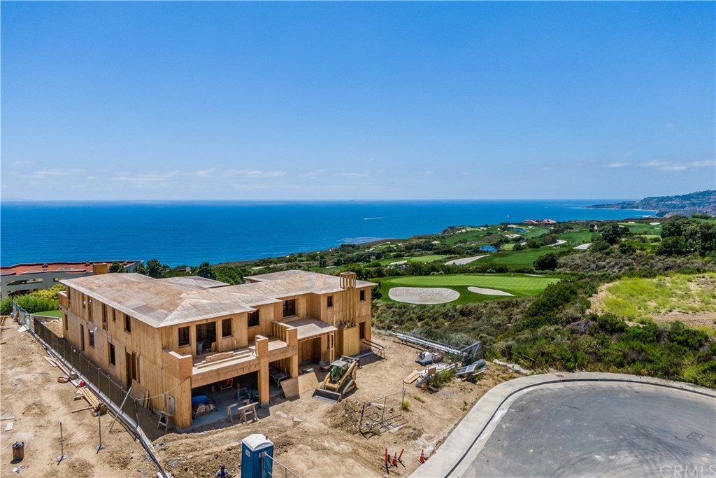 At the end of a culdesac street with tons of privacy and stunning golf course and ocean views. This home will be complete in December 2020. Purchase now and customize the home to your finish style.
