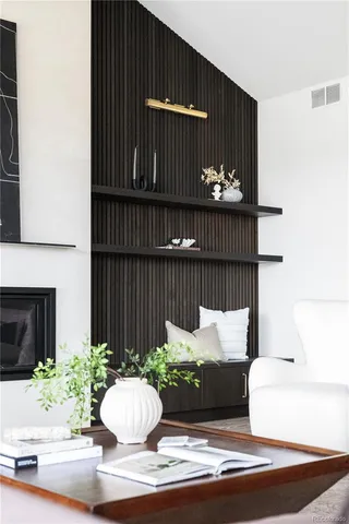 a bathroom with a mirror and a shower