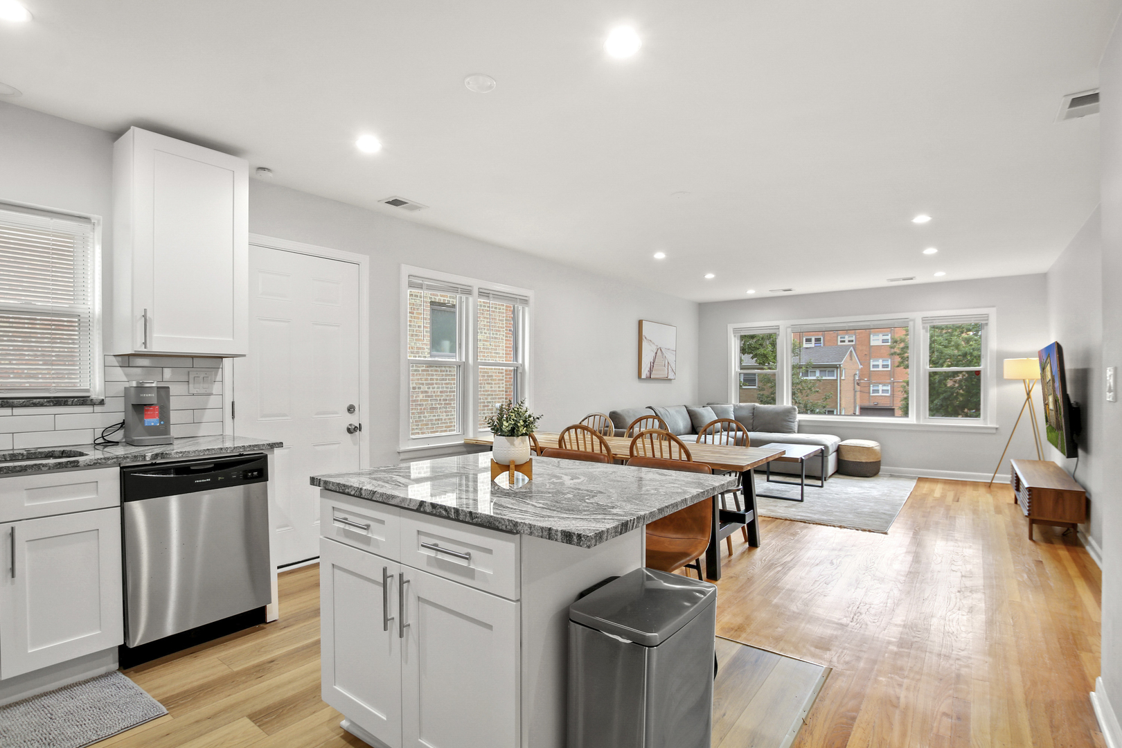 236 Callan Avenue, Unit 3 Evanston, IL 60202 - Photo 5 of 15 a kitchen that has a lot of cabinets a sink and appliances in it