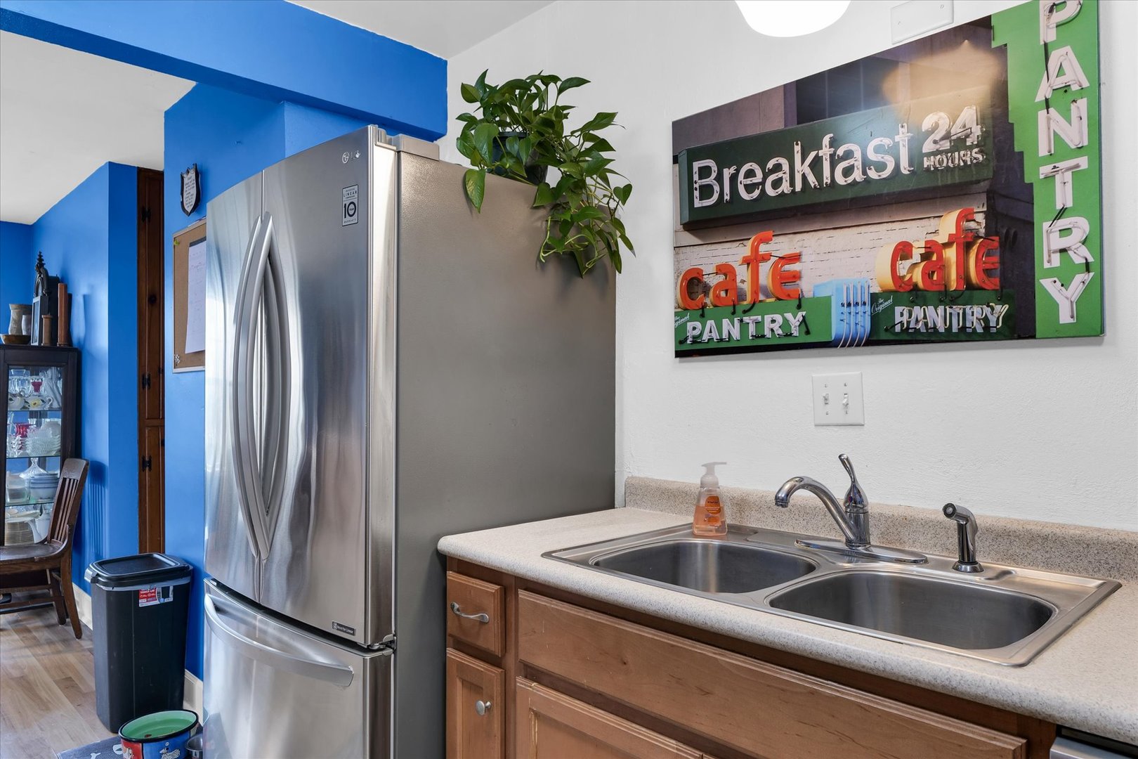 911 Foley Avenue Champaign, IL 61820 - Photo 12 of 33 a kitchen with stainless steel appliances granite countertop a refrigerator and a sink