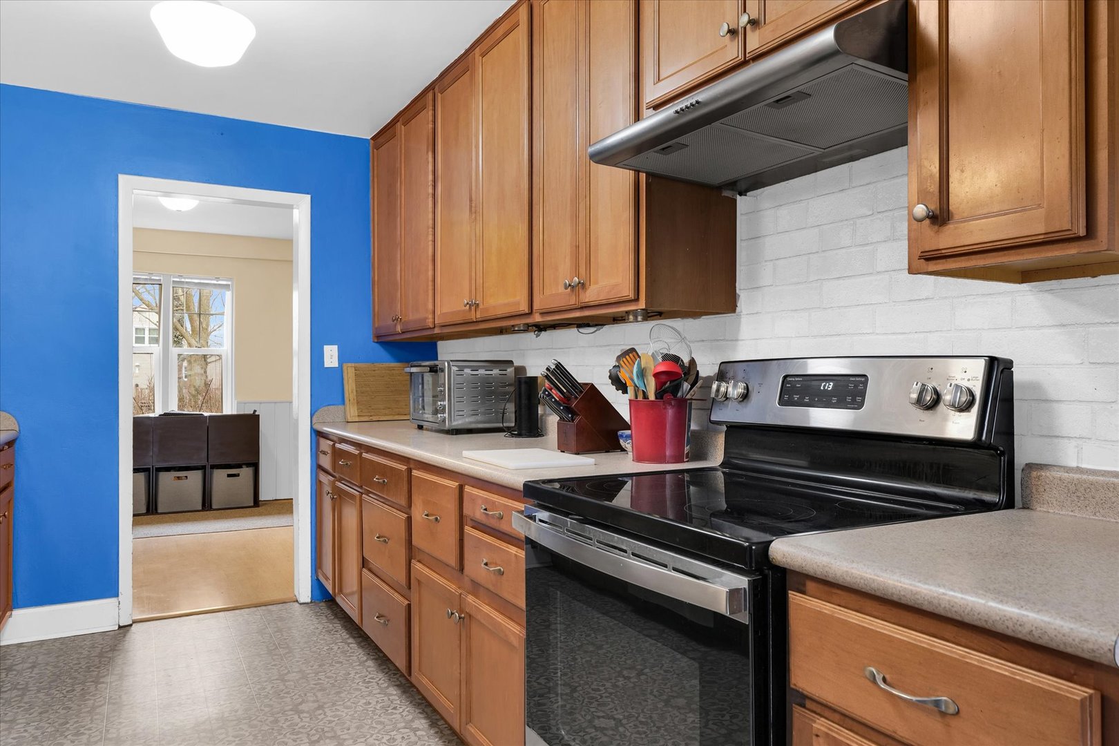 911 Foley Avenue Champaign, IL 61820 - Photo 13 of 33 a kitchen with a stove and a sink