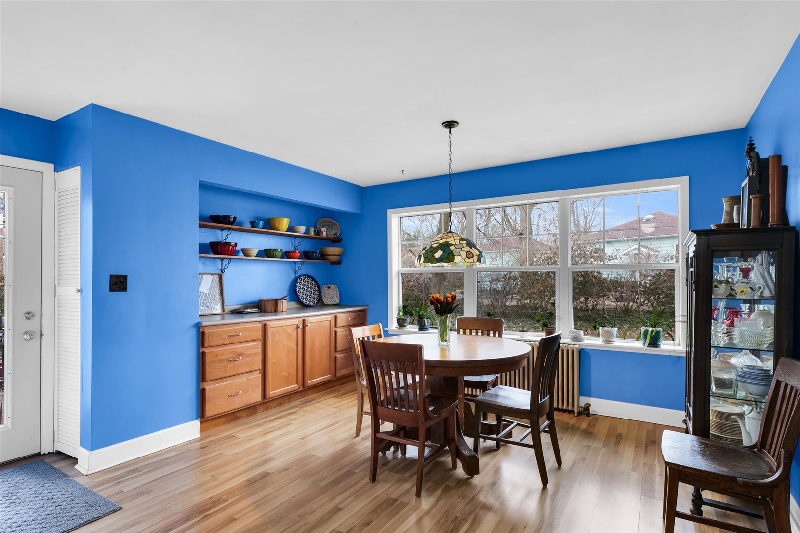 911 Foley Avenue Champaign, IL 61820 - Photo 14 of 33 a dining room with furniture and wooden floor