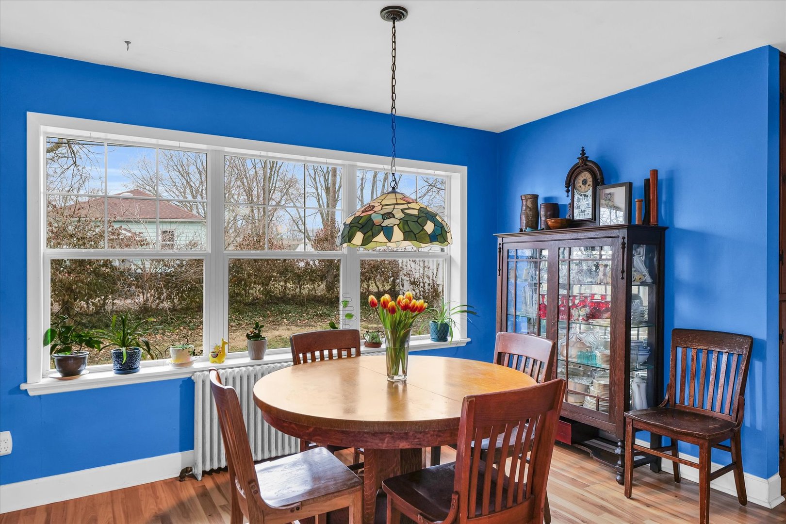 911 Foley Avenue Champaign, IL 61820 - Photo 15 of 33 a view of a dining room with furniture window and wooden floor