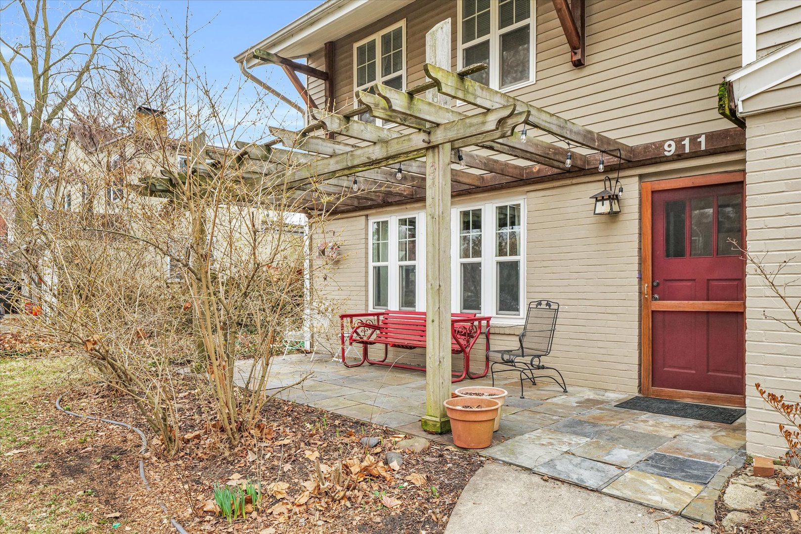 911 Foley Avenue Champaign, IL 61820 - Photo 2 of 33 a building outdoor space with patio furniture