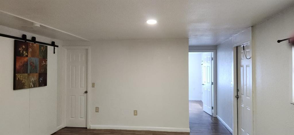 10482 Marina Way Boca Raton, FL 33428 - Photo 3 of 16 a view of a hallway with wooden floor and closet