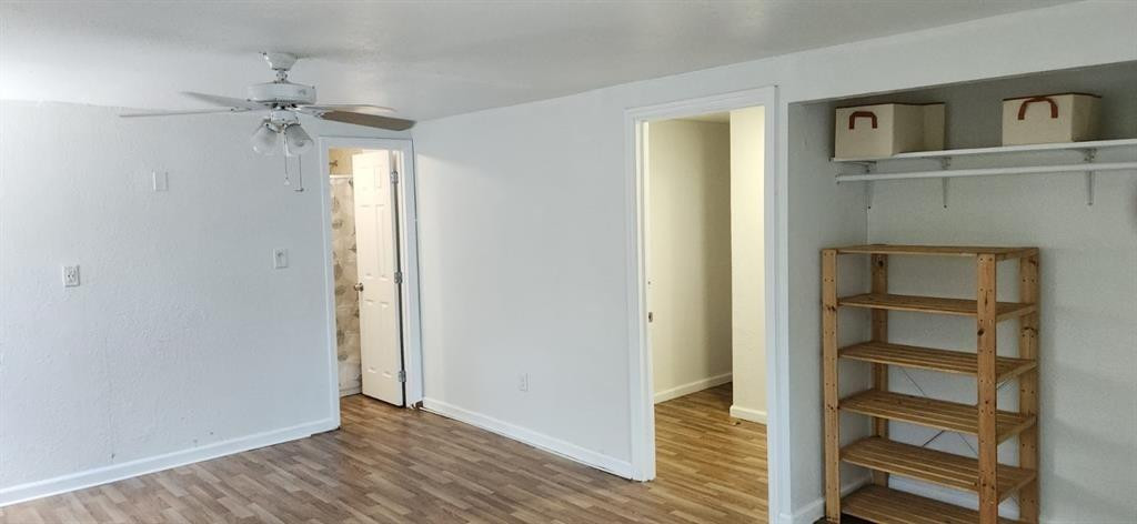 10482 Marina Way Boca Raton, FL 33428 - Photo 5 of 16 a view of a hallway with closet and a window