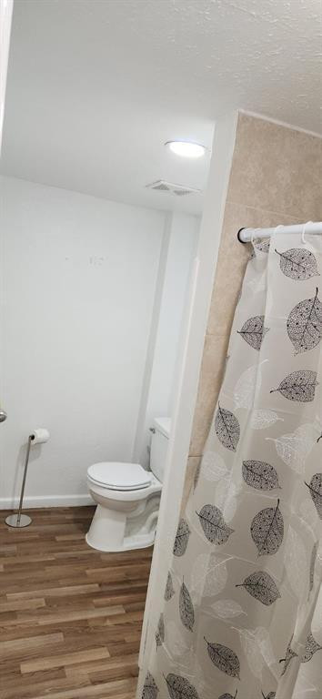 10482 Marina Way Boca Raton, FL 33428 - Photo 6 of 16 a white toilet sitting next to a shower