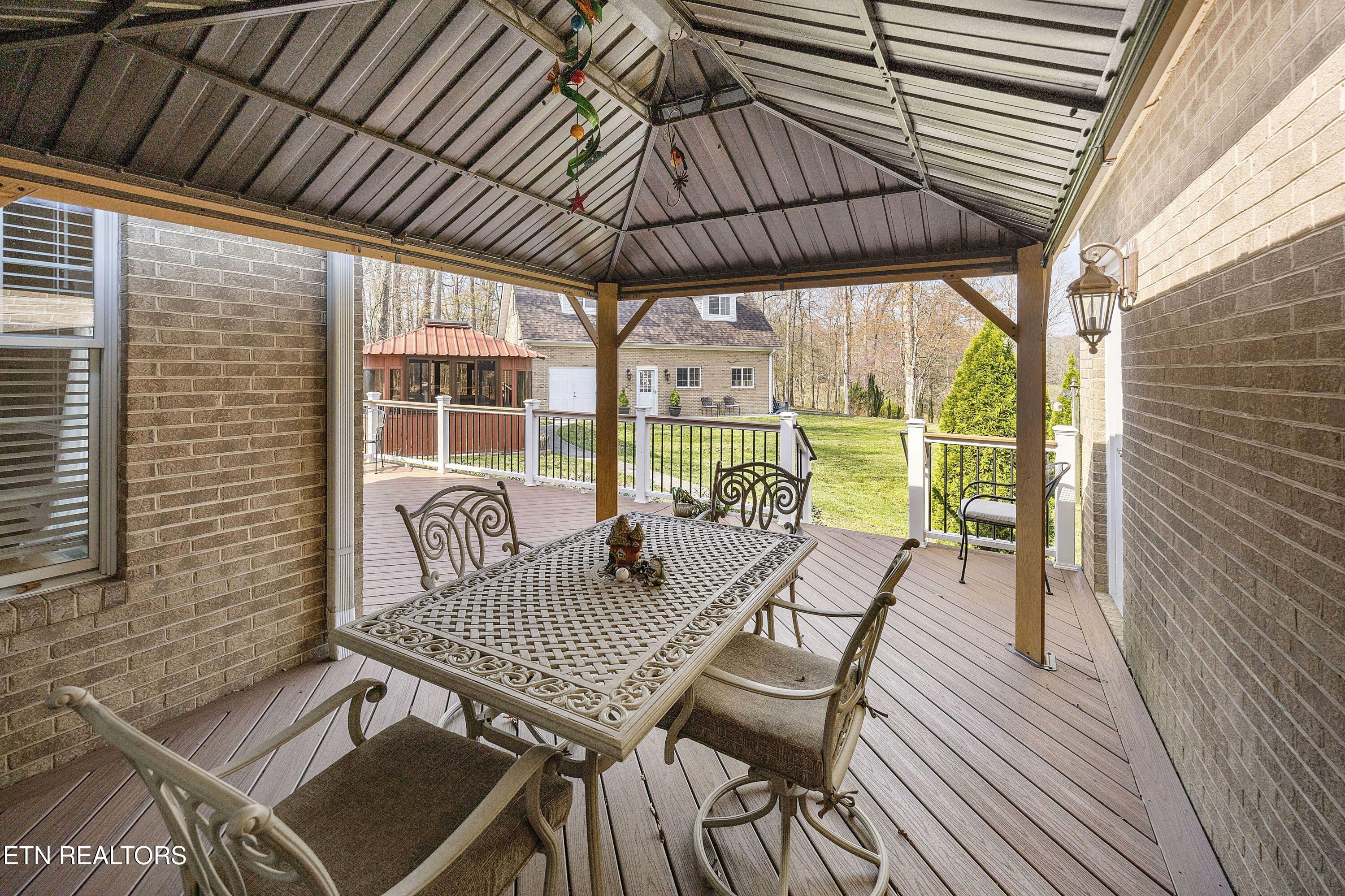 225 Alpine Drive Clinton, TN 37716 - Photo 36 of 41 Covered Back Deck Area