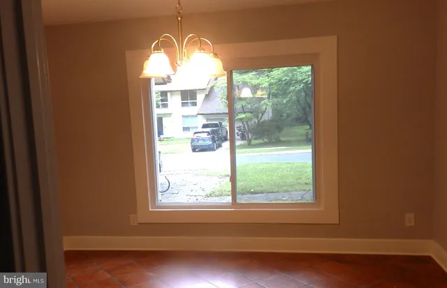 a view of a room that has a window