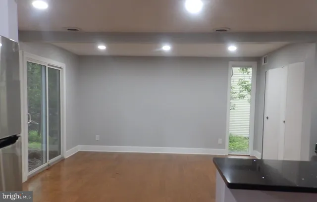 an empty room with windows