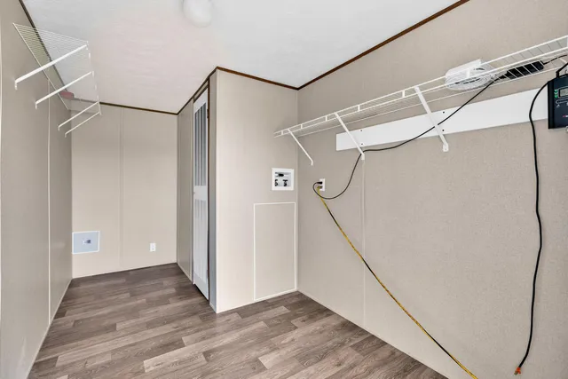 a bathroom with a toilet a sink and a mirror