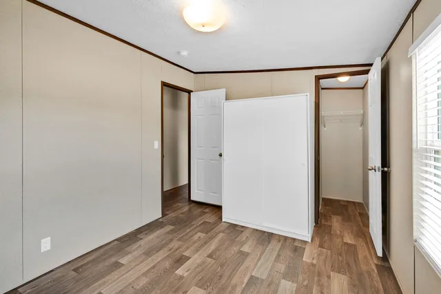 a view of a house with outdoor space and street view