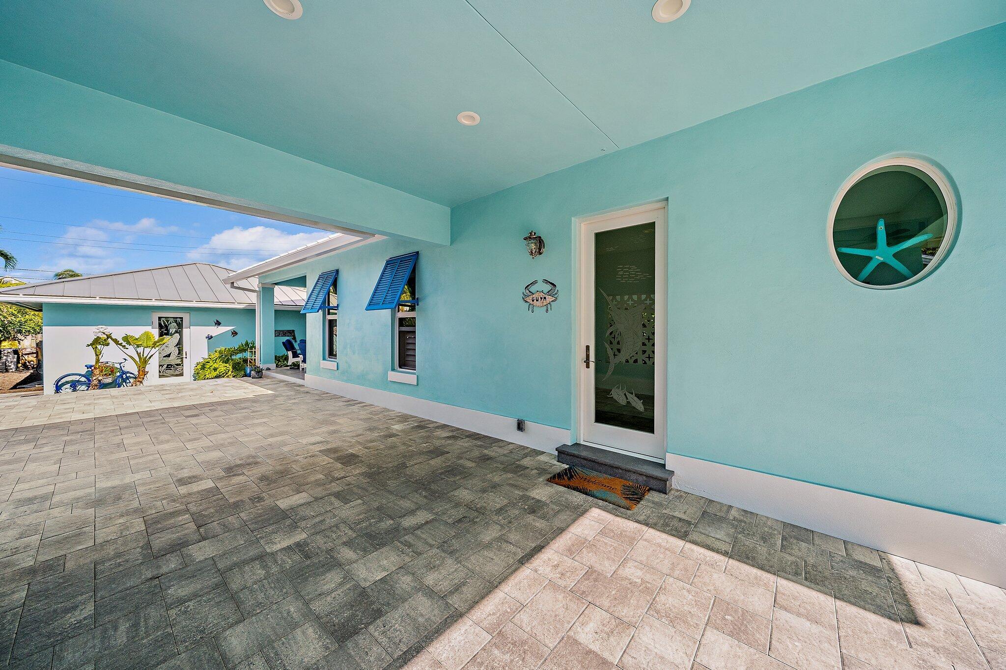 3443 Inlet Court Jupiter, FL 33469 - Photo 17 of 59 a view of an entrance of the house