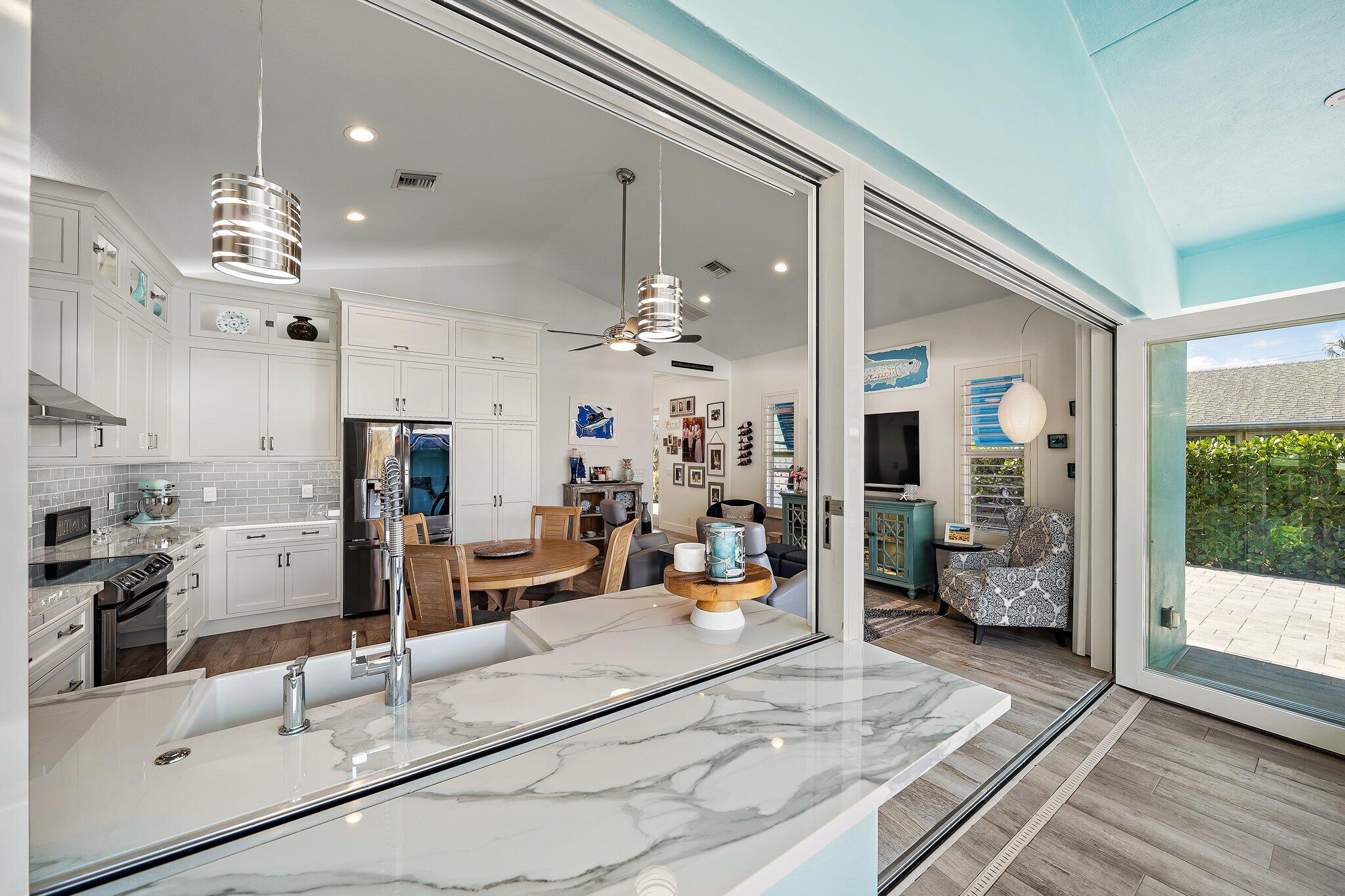 3443 Inlet Court Jupiter, FL 33469 - Photo 40 of 59 LIVING TO PORCH