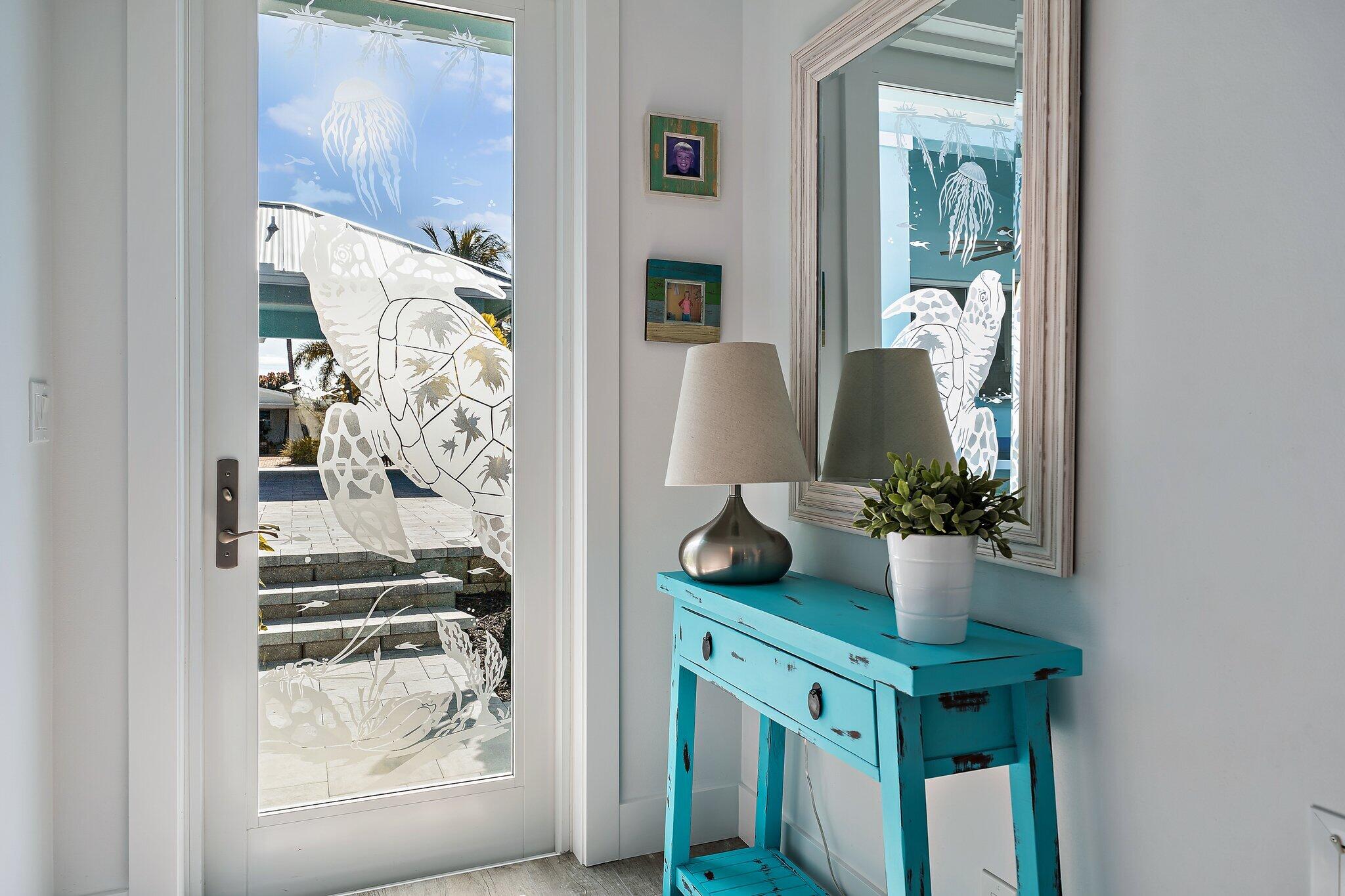 3443 Inlet Court Jupiter, FL 33469 - Photo 46 of 59 a view of table and chair in wooden floor