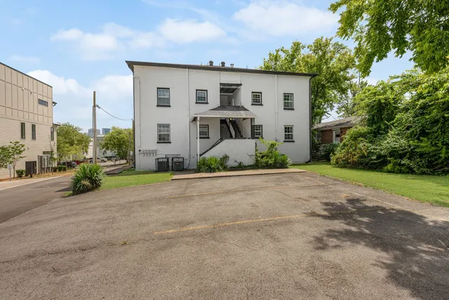 a view of a house with a street