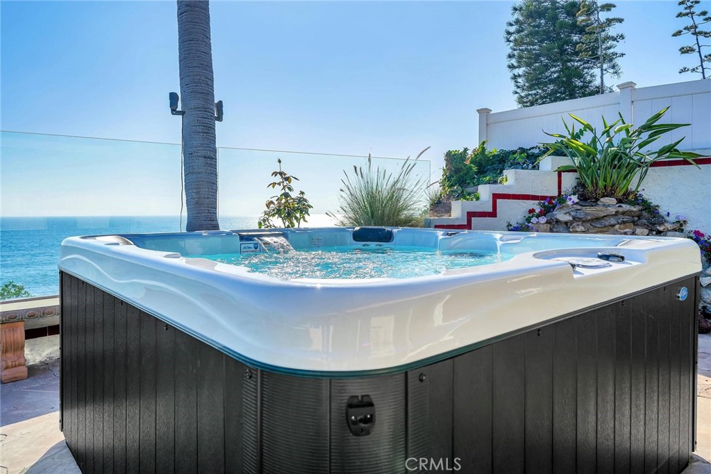 18034 Coastline Drive Malibu, CA 90265 - Photo 13 of 24 a view of bathroom with a sink and potted plants
