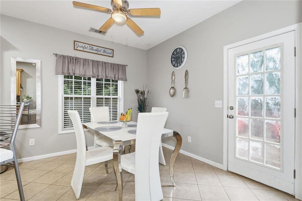 170 Sable Trace Trail Acworth, GA 30102 - Photo 12 of 48 a view of a dining room with furniture window and outside view