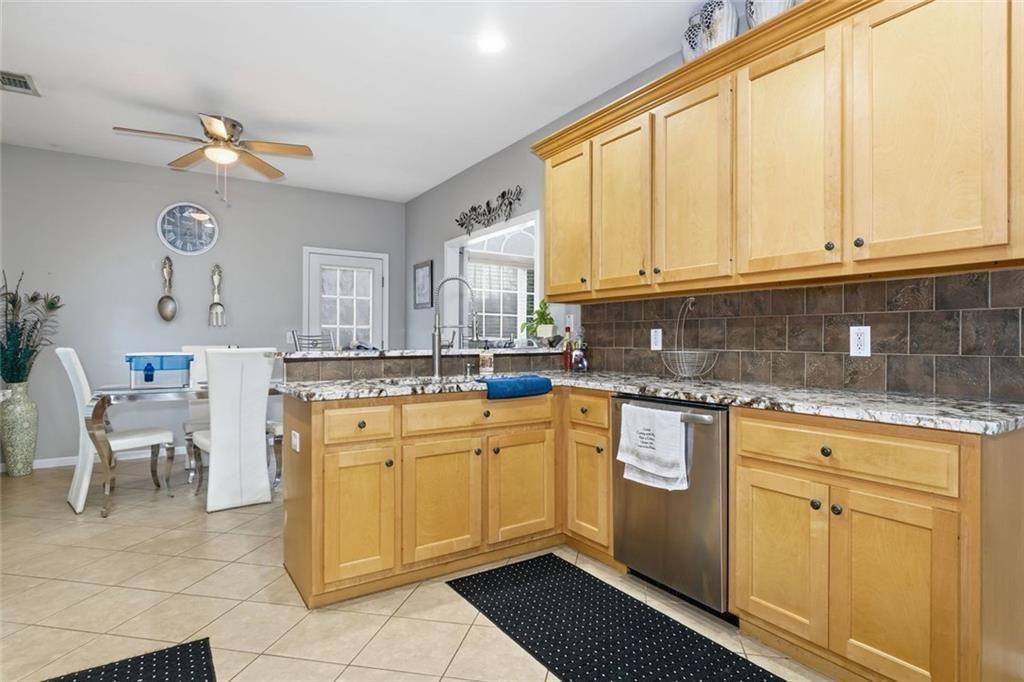 170 Sable Trace Trail Acworth, GA 30102 - Photo 17 of 48 a kitchen with cabinets appliances and a window