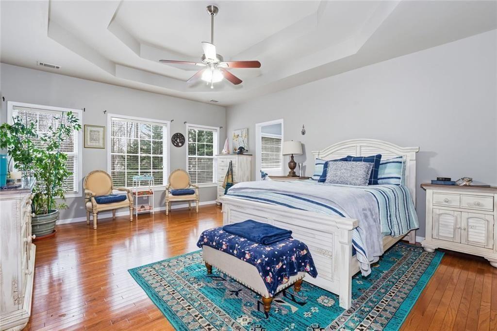 170 Sable Trace Trail Acworth, GA 30102 - Photo 20 of 48 a bedroom with bed and wooden floor