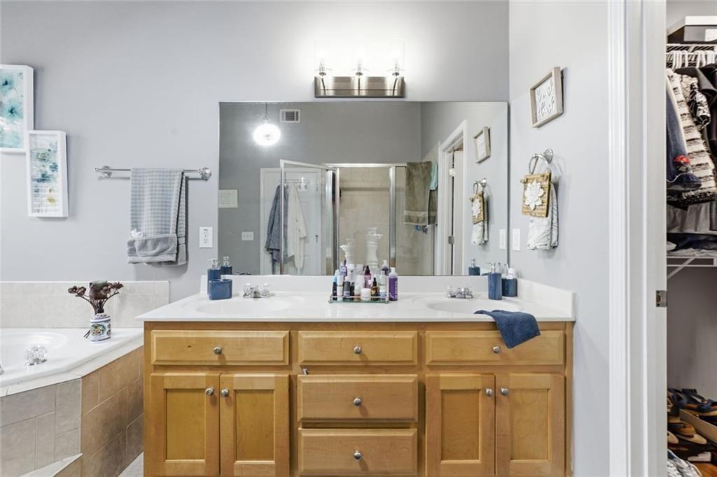 170 Sable Trace Trail Acworth, GA 30102 - Photo 24 of 48 a bathroom with a sink and a mirror