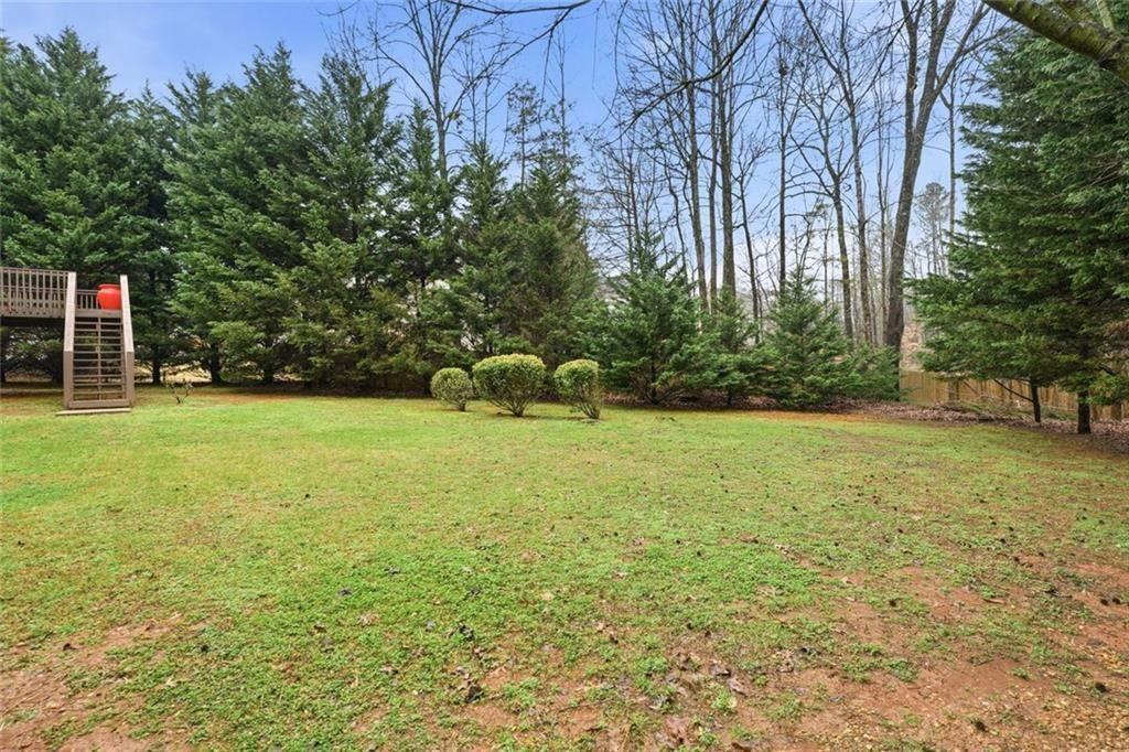 170 Sable Trace Trail Acworth, GA 30102 - Photo 39 of 48 a view of a garden with a house