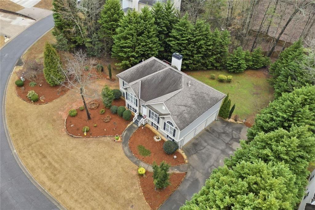 170 Sable Trace Trail Acworth, GA 30102 - Photo 42 of 48 an aerial view of a house with outdoor space and trees all around