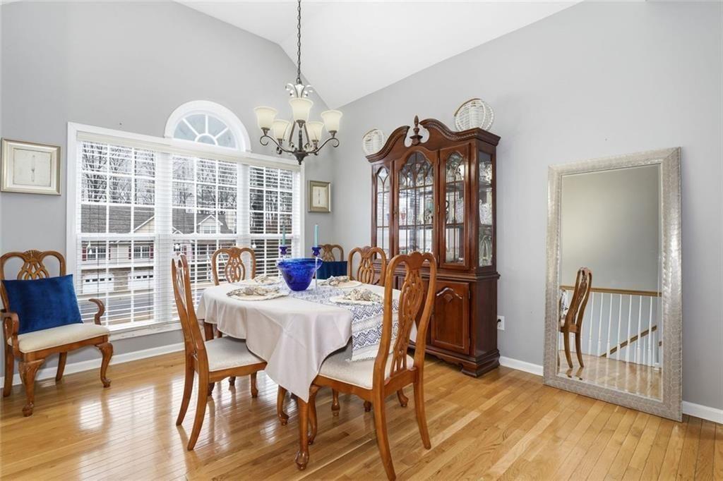 170 Sable Trace Trail Acworth, GA 30102 - Photo 10 of 48 a view of a dining room with furniture window and wooden floor