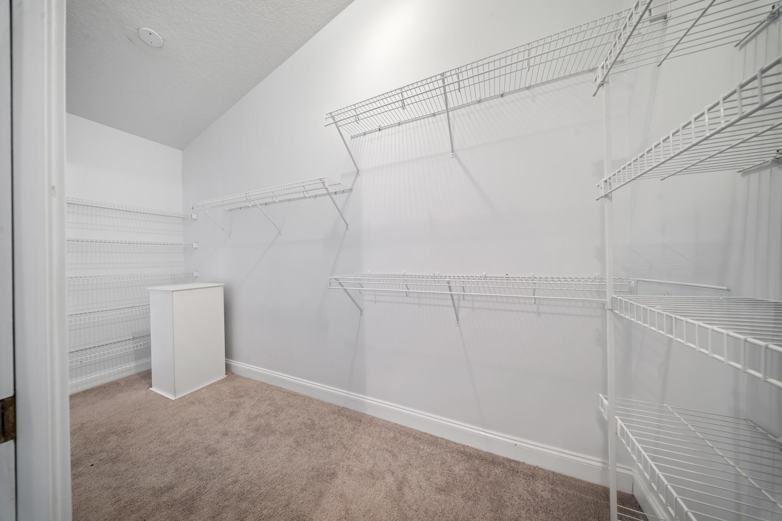 8686 Andrews Avenue Fort Pierce, FL 34945 - Photo 54 of 76 a view of a room with racks on the wall