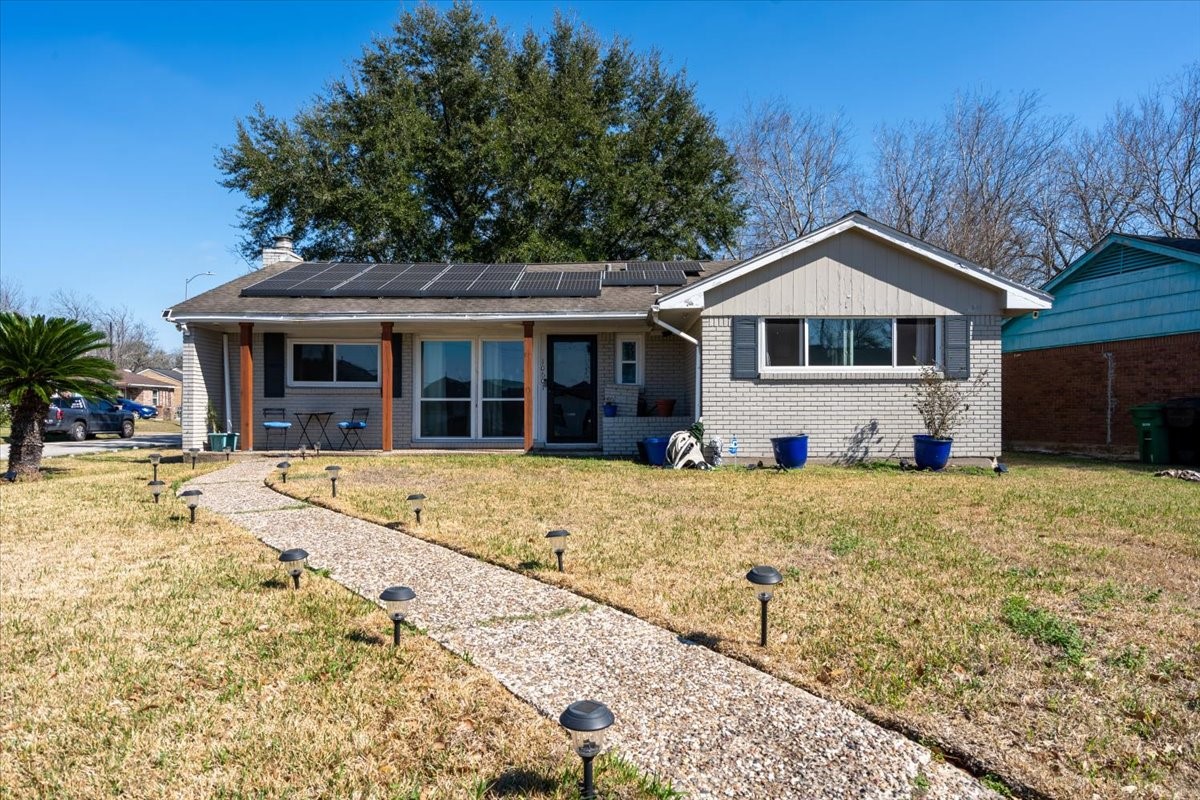 10601 Buffum Street Houston, TX 77051 - Photo 2 of 50 a front view of a house with a yard