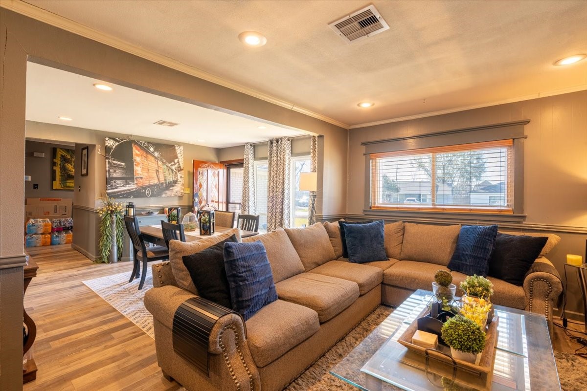 10601 Buffum Street Houston, TX 77051 - Photo 21 of 50 a living room with furniture and a large window