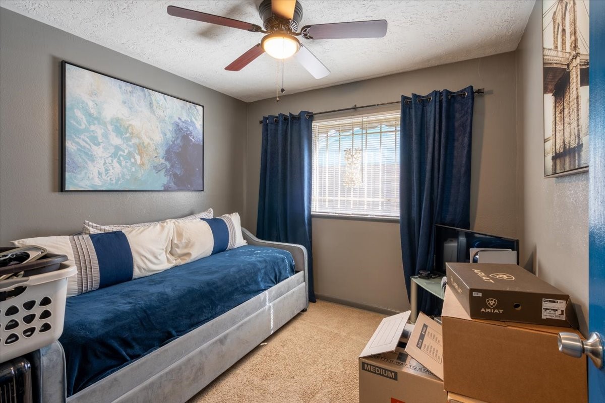 10601 Buffum Street Houston, TX 77051 - Photo 26 of 50 a living room with furniture and a window