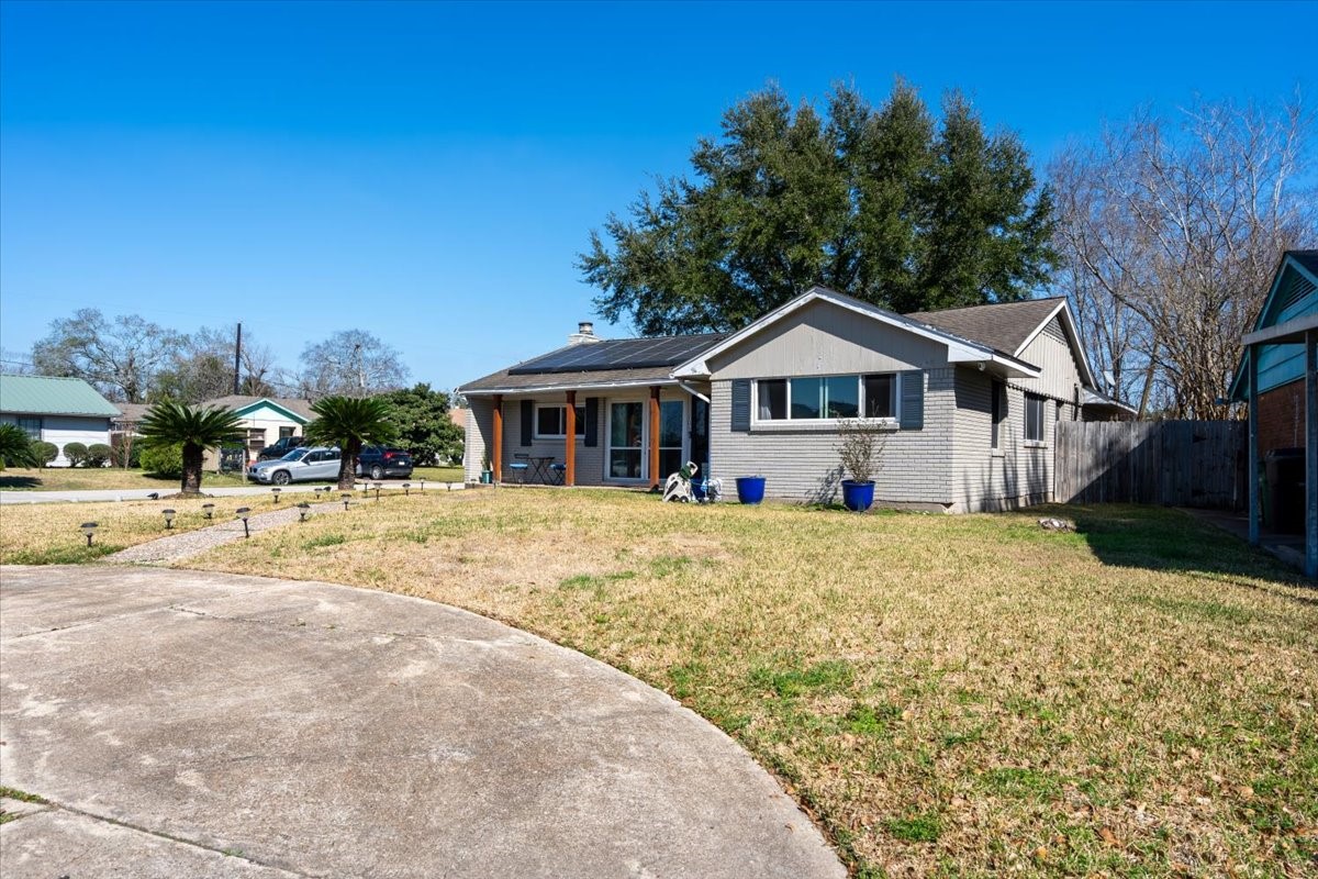 10601 Buffum Street Houston, TX 77051 - Photo 3 of 50 a front view of a house with a yard