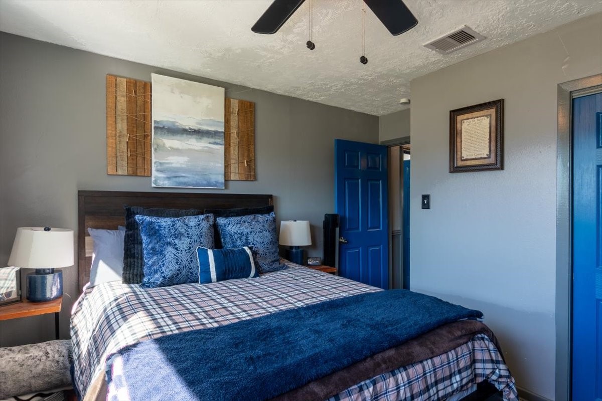 10601 Buffum Street Houston, TX 77051 - Photo 31 of 50 a bedroom with a bed and a window