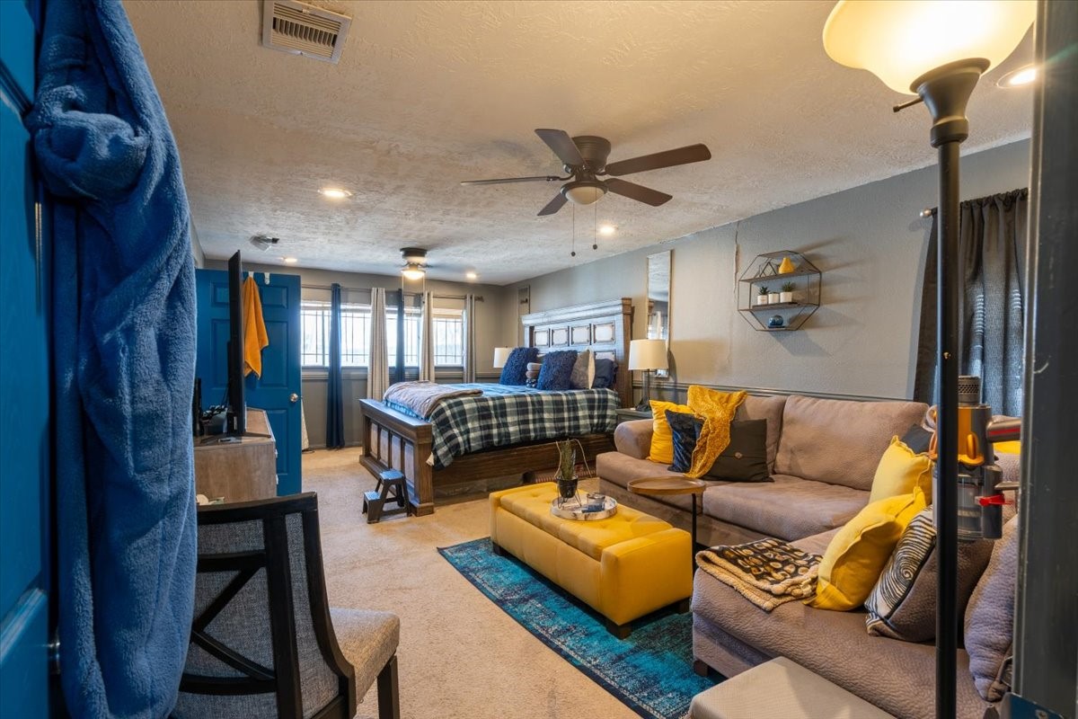 10601 Buffum Street Houston, TX 77051 - Photo 33 of 50 a living room with furniture and a wooden floor