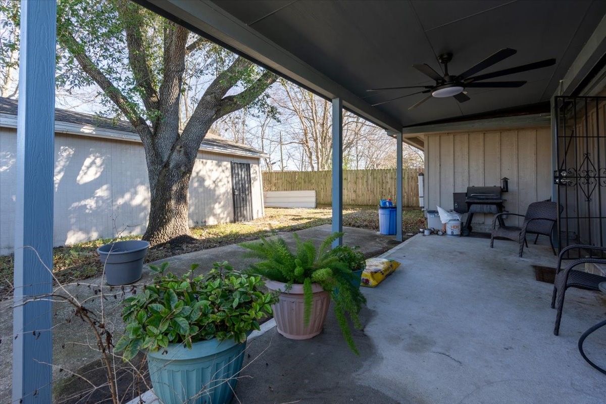 10601 Buffum Street Houston, TX 77051 - Photo 43 of 50 a living room filled with furniture and a potted plant
