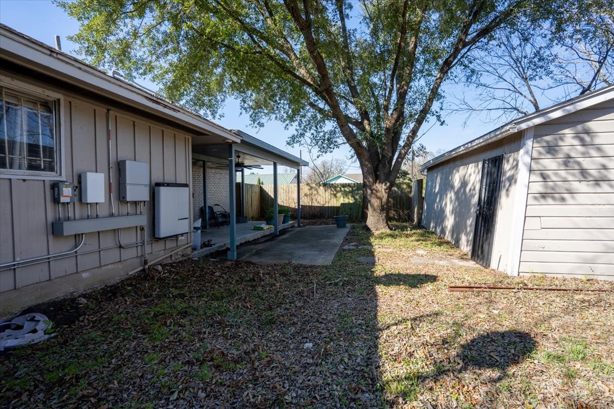 10601 Buffum Street Houston, TX 77051 - Photo 45 of 50 a backyard of a house with lots of green space