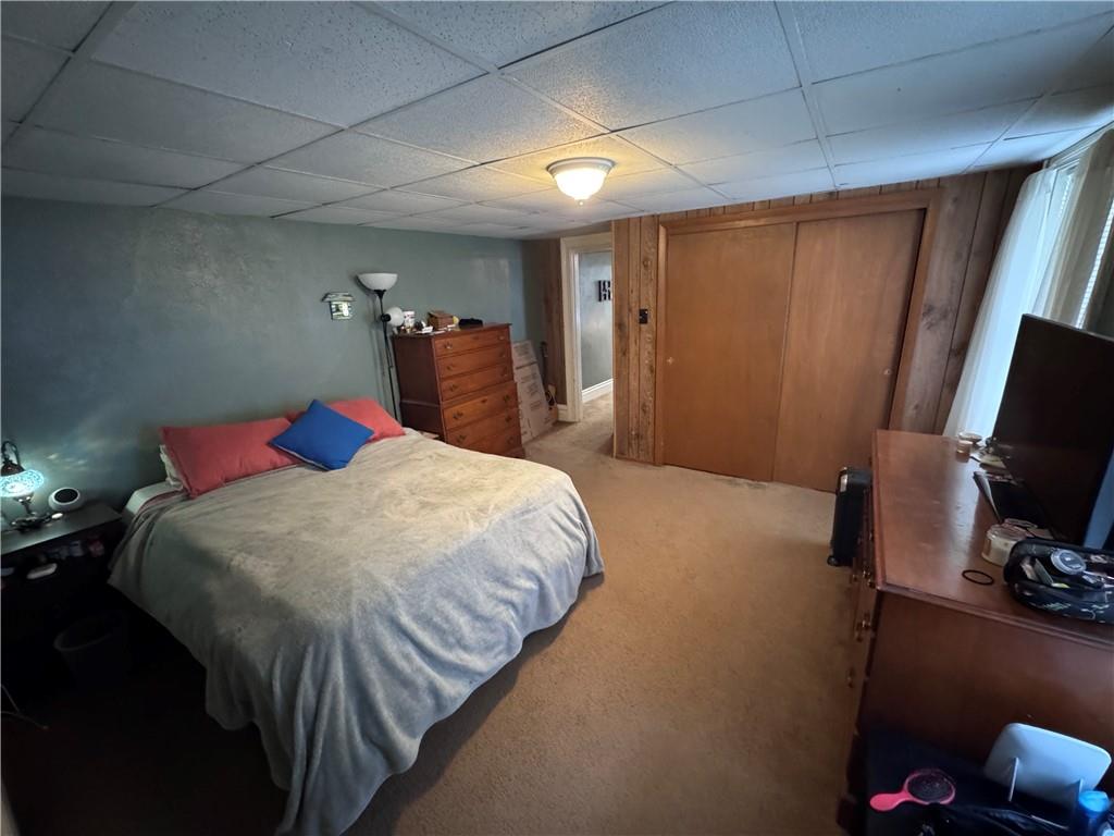 903 North Avenue, Unit 2 Pittsburgh, PA 15209 - Photo 7 of 13 a bed sitting in a bedroom next to a window